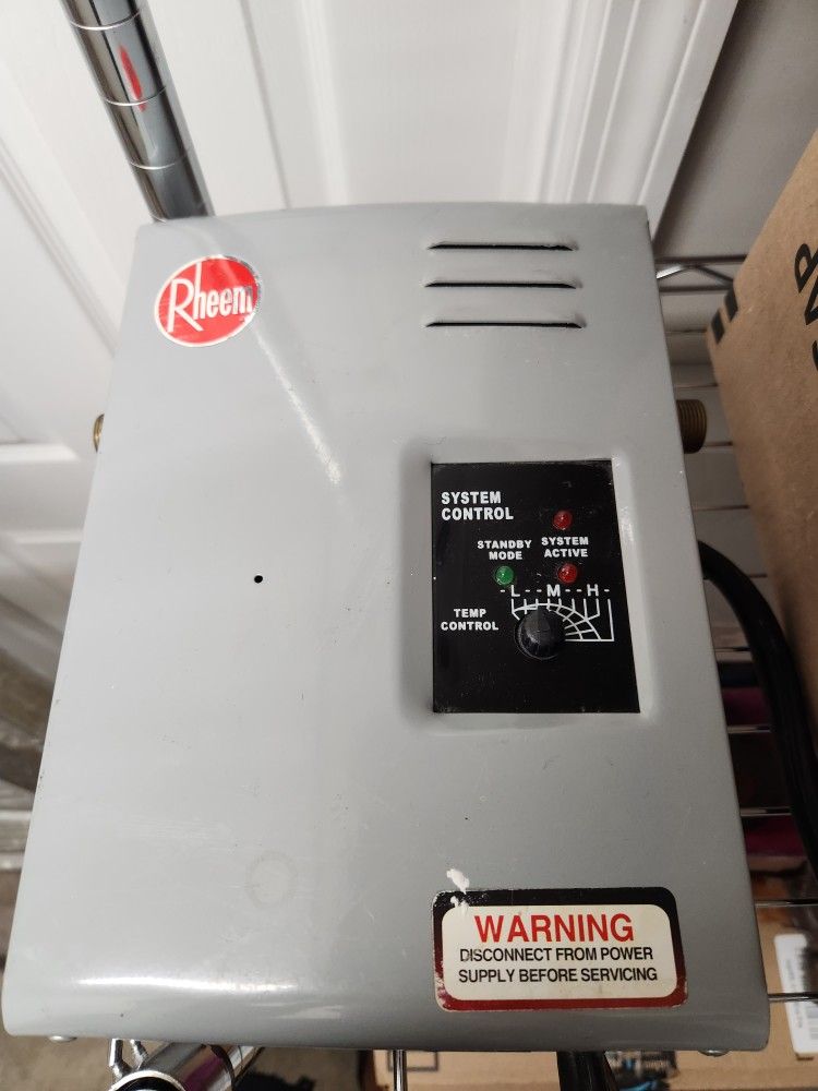 Refurbished Tankless Water Heater. Electric Rheem RTE 13 for Sale in