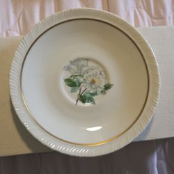 Silver Rose" pattern by Hanover China, featuring a white rose motif and gold trim.