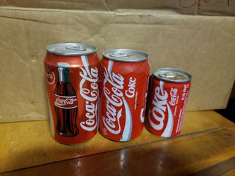 Collectible vintage coke bottles/cans