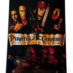 Wall hanging, made out of wood and laminate pirates of the Caribbean movie plaque