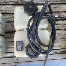 Two outboard motors oil tank