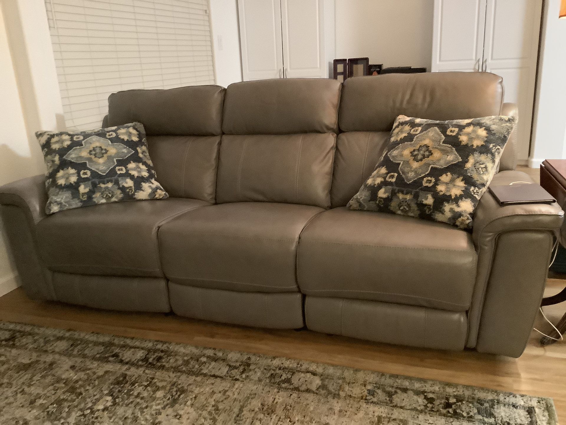Dual power reclining sofa