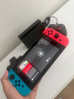 Nintendo switch with 120GB SD and controllers