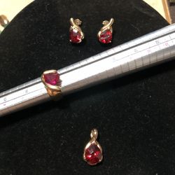 Matching sterling silver earrings,ring size 6 1/2, and pendent