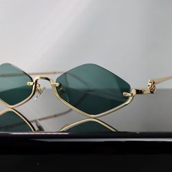 Gucci Geometric Sunglasses in Gold with Gray Lens