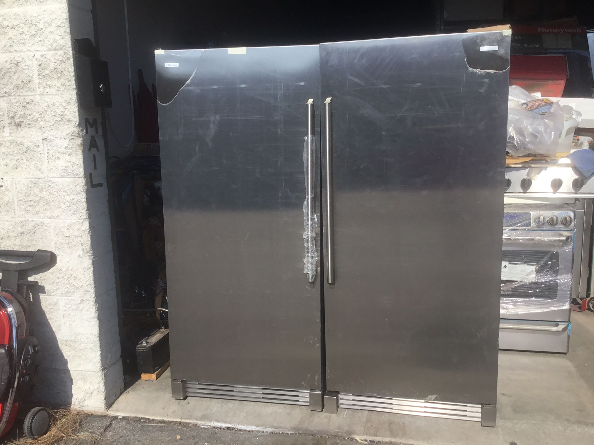 New up right freezer and refrigerator Electrolux stainless steel w 64”