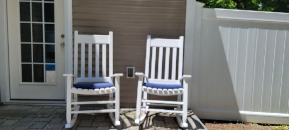 2 White Rocking Chairs With Navy Cushions