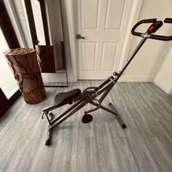 Sunny Health & Fitness Row-N-Ride-  Squat Machine