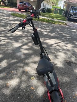 Electric scooter with seat