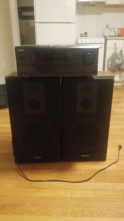 2 technics speakers and 1 onkyo amplifier