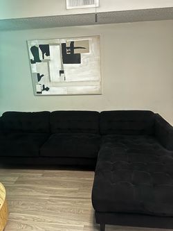 Charcoal black Sectional couch semi new.