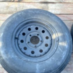TWO NEW 13”RADIAL TIRES ON STEEL RIMS