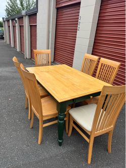 Wooden table and six chairs