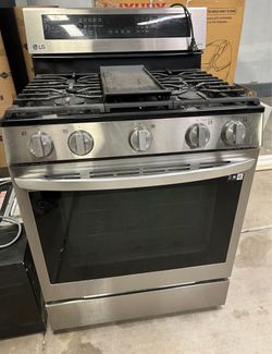 LG Kitchen appliance set  Stainless steel oven gas range stove, dishwasher, and microwave