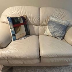 White Leather Loveseat And Overstuffed Chair With Ottoman