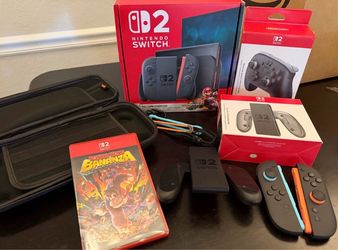 Nintendo switch 2 with games and controllers