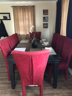 Solid wood table in great condition seats 8 chairs included