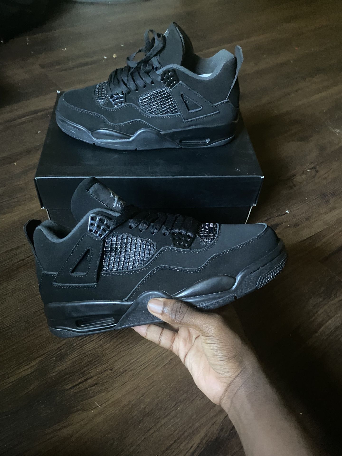 Black Cat Jordan 4’s