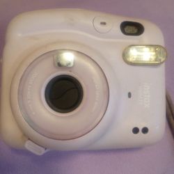 Instax Mini polaroid camera with flash
