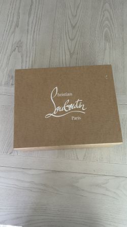 Christian Louboutin black patent leather red bottoms