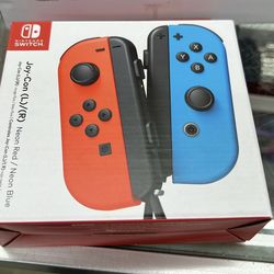 Nintendo Switch Joy Con L/R Neon Red / Neon Blue