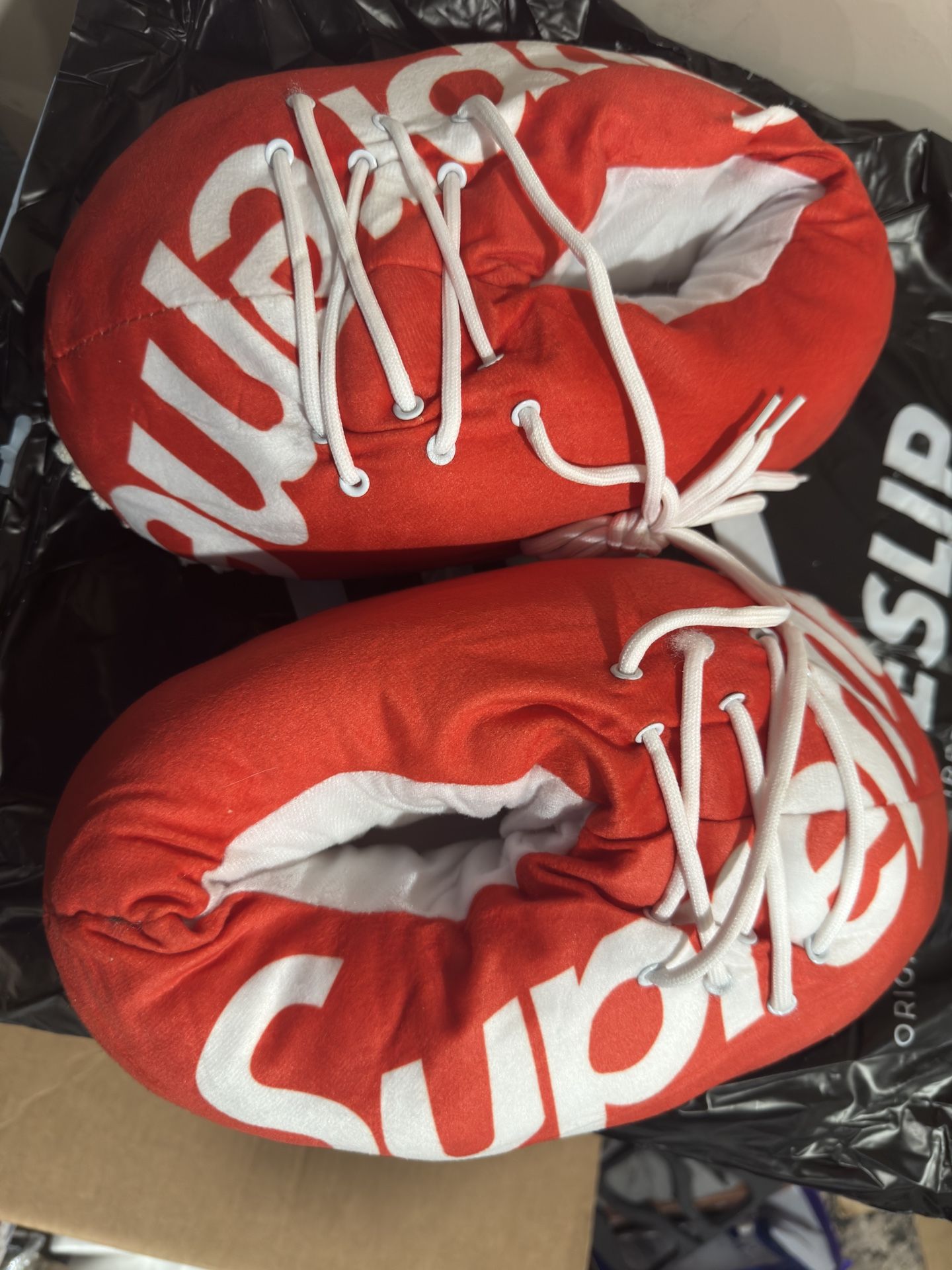 These are Supreme Plush Shoe Slippers. Novelty
