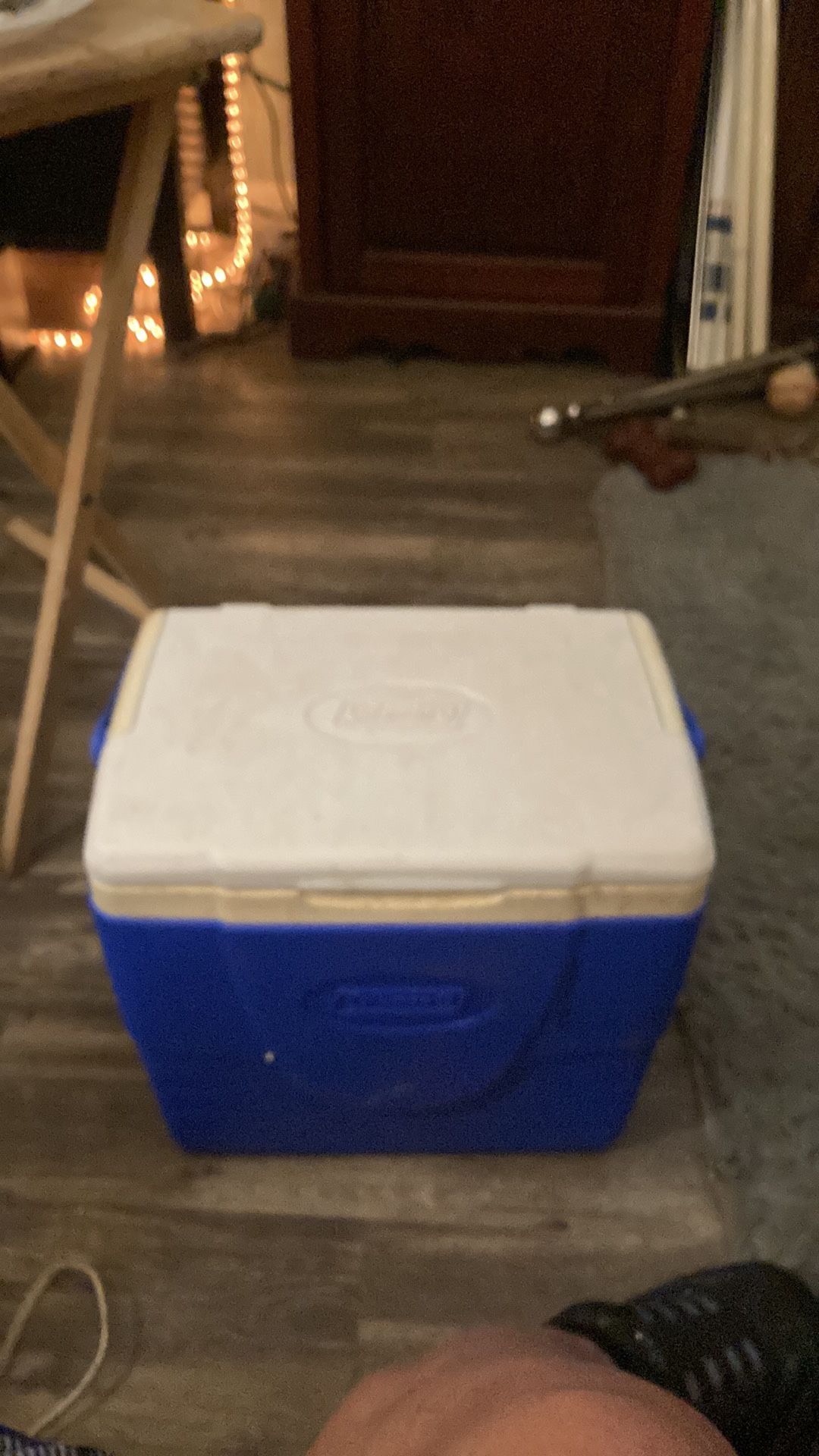 Blue and white Coleman cooler