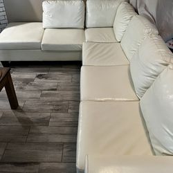 Left hand white leather sofa with ottoman