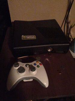 Xbox 360 console with controller