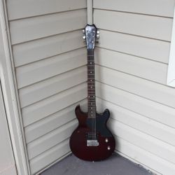 Vintage 2000s First Act Right-Handed Electric Guitar – Mahogany with Walnut Neck, Heavily Used, Great for Beginners or Band Starters