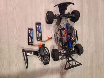 Vxl slash in good condition just need a body...has 3 batteries & charger 200firm cash...charger cost 150 new alone