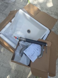 Ceramic vessel sink and 10-in faucet