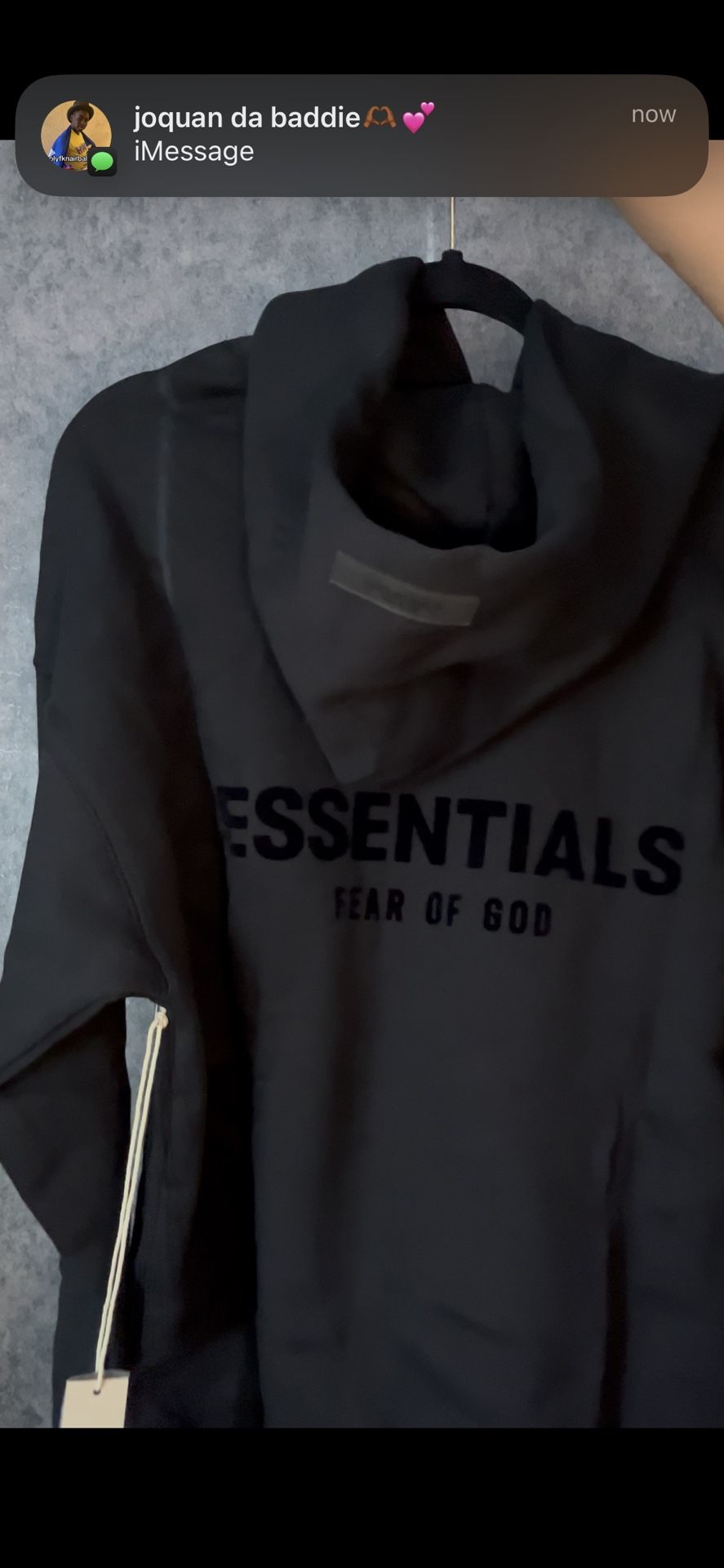 black essential hoodie
