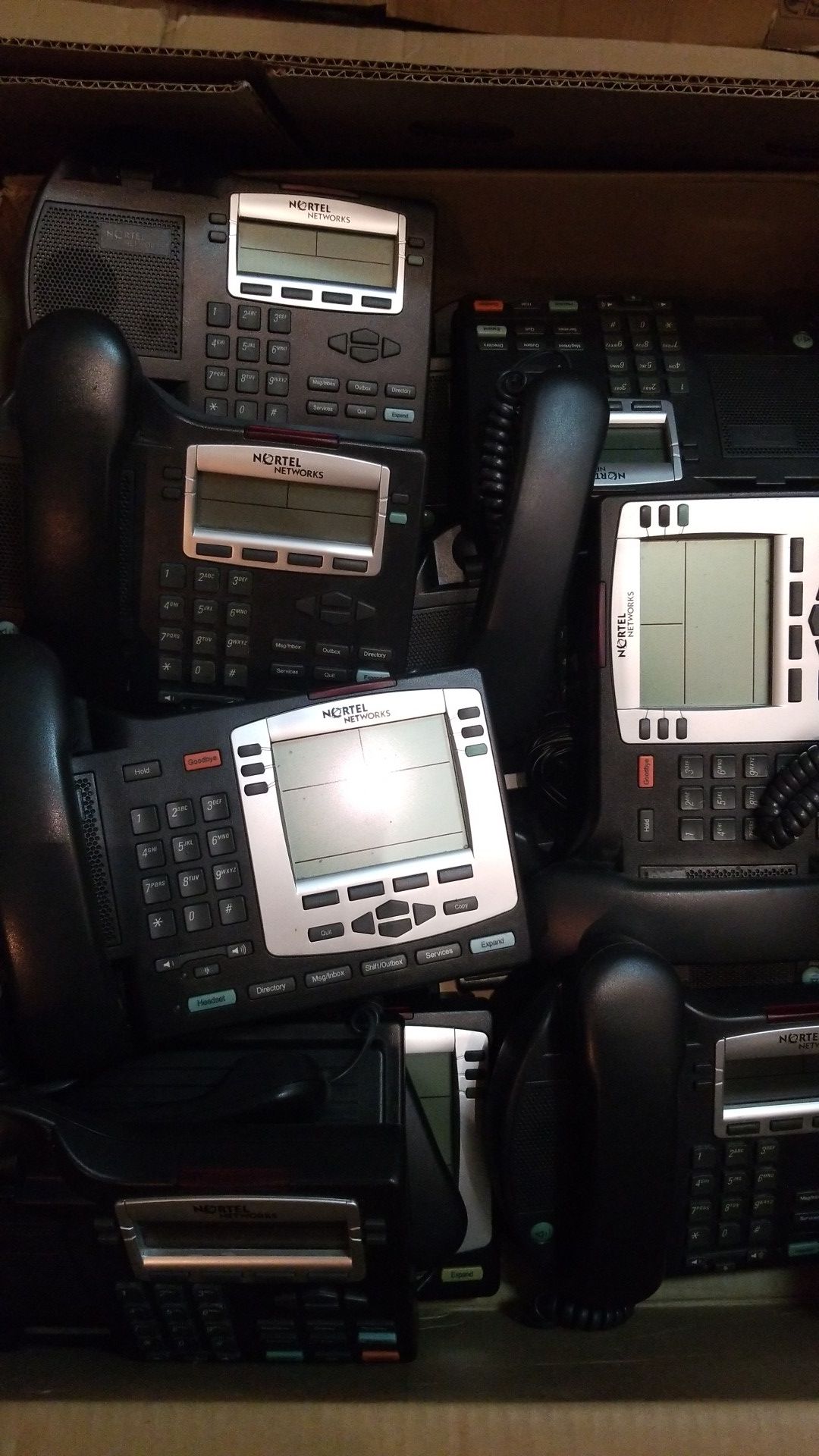 Box of Nortel/ Mitel VOIP phones