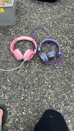 Three Sets Of Head Phones 