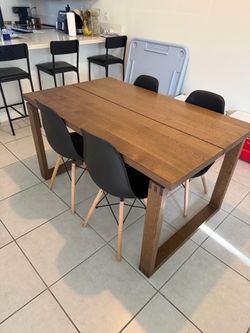 Wooden table 4 plastic chairs