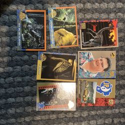 Vintage 1993 Jurassic Park Trading Card Lot – 7 Cards – Topps Movie Cards  ⸻  Description  Small lot of original 1993 Topps Jurassic Park trading card