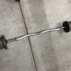 curl bar & 28 lbs of plates