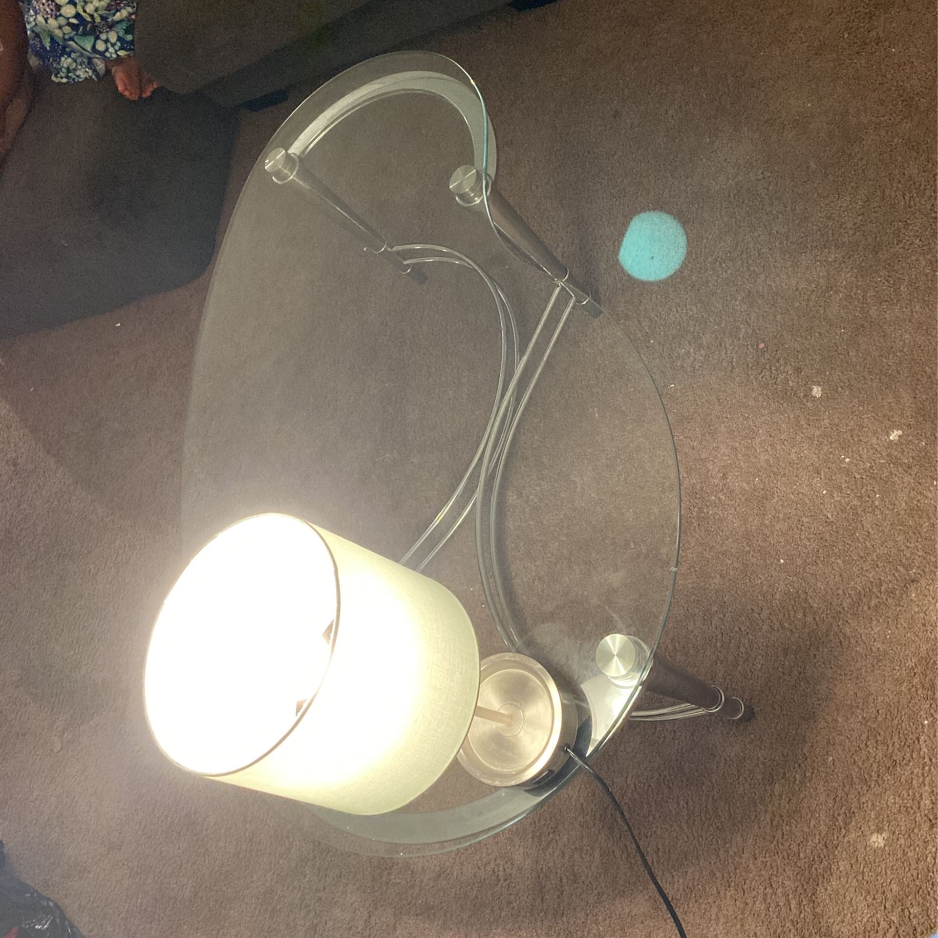 Glass table with silver Leg