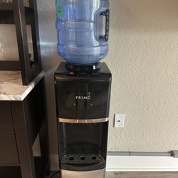 Primo Water Cooler (W/ 3 Five Gallon Jugs)