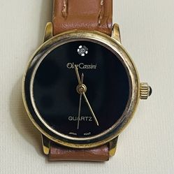 🔲.     WOMEN WATCH OLEG CASSINI DIAMOND 