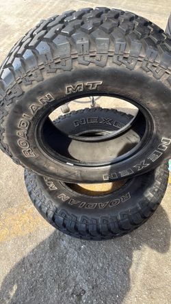 Used Tire Pair 235 / 75 R15 MT