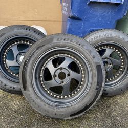 4 black Avid 1 wheels 195/65R15 Douglas all season tires 