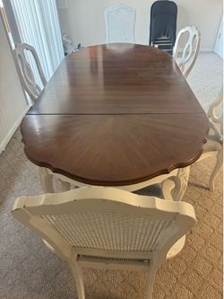 Wood brown table with chairs