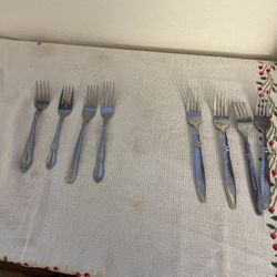 8 pieces of stainless steel forks $1 each