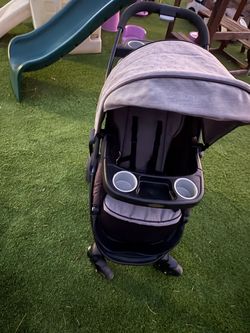 Graco Baby Stroller with Canopy and Cup Holders