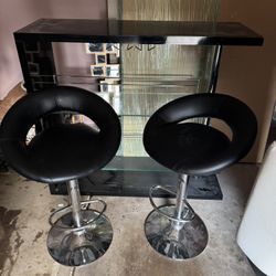Bar With 2 Black Bar Stools 