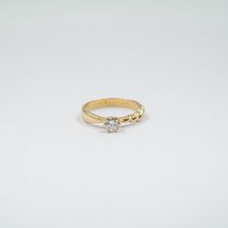 Half-Twisted Tapered Solitaire Diamond Ring