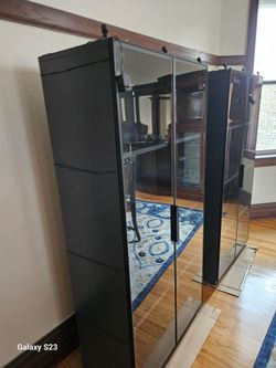 Black glass display cabinets