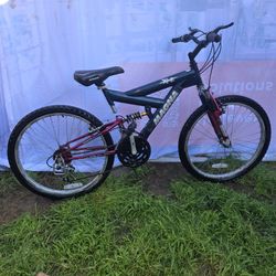 Magna XL2 dual suspension mountain bike. 
Features a dual suspension frame.
Equipped with a 21-speed drivetrain.
Typically utilizes 24-inch or 26-inch